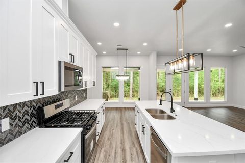 Photo of 12163 La Salle River Rd Rd, Conroe, TX 77316 (MLS # 10809345)