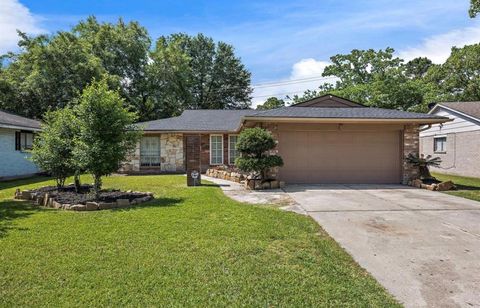 Photo of 7519 Silent Wood Lane, Houston, TX 77086 (MLS # 62826121)