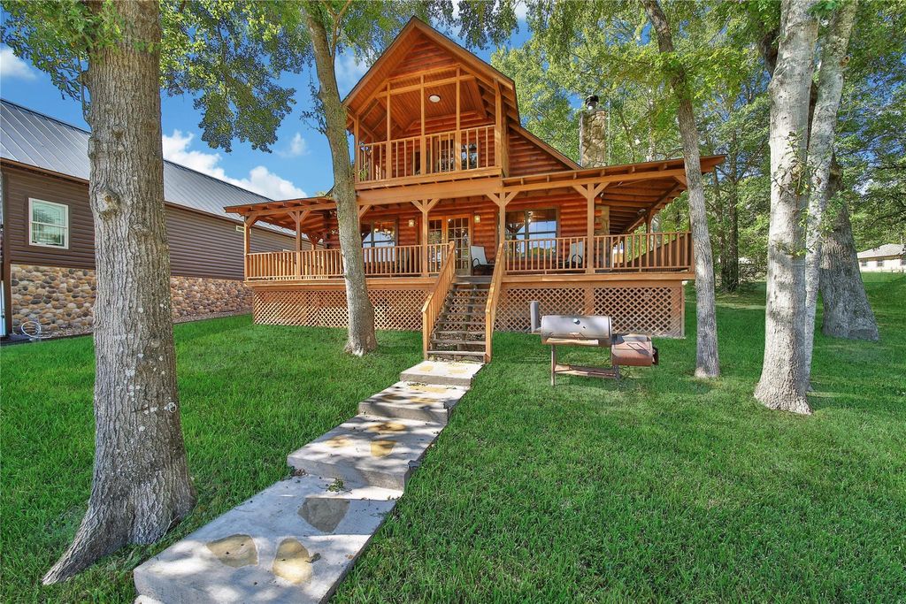 Photo of 76 Hunters Creek Drive, Huntsville, TX 77340 (MLS # 84437430)