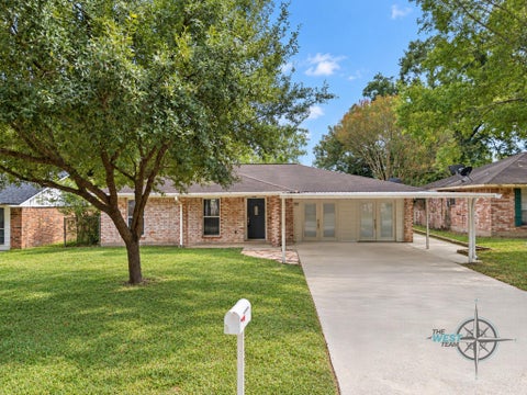 Photo of 707 Hildred Avenue, Conroe, TX 77303 (MLS # 92541899)