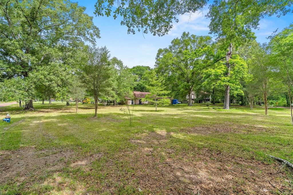 Photo of 38 Woodbranch Drive, Woodbranch, TX 77357 (MLS # 75306695)