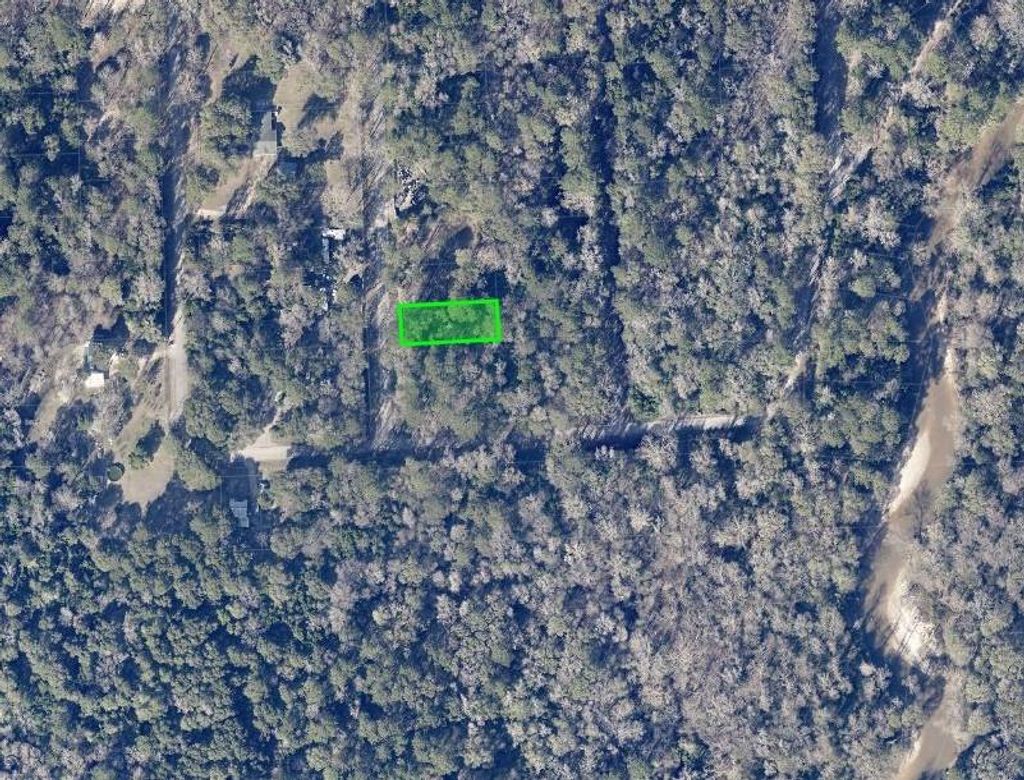 Photo of 0 Idle Wild Road, New Caney, TX 77357 (MLS # 11557753)