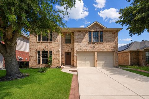Photo of 5918 Stirring Winds Lane, Houston, TX 77086 (MLS # 94854566)