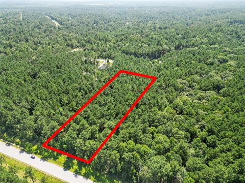 Photo of 77 Wagon Pass Drive Drive, Huntsville, TX 77340 (MLS # 61075575)