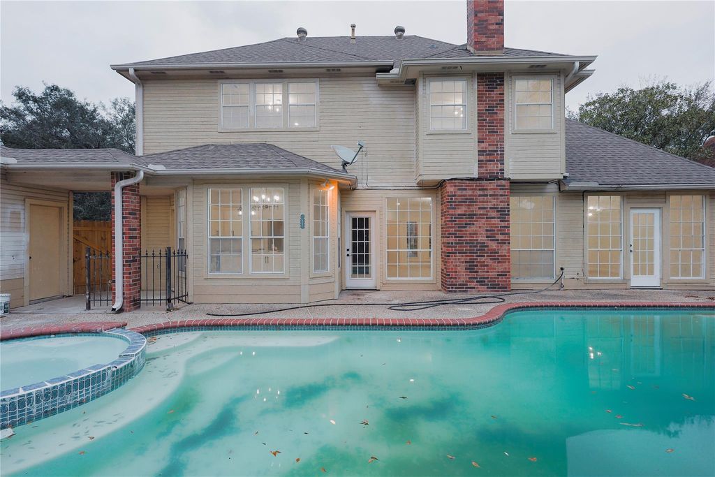 Photo of 17527 Sandy Cliffs Drive, Houston, TX 77090 (MLS # 56734329)
