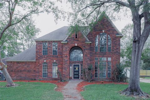 Photo of 17527 Sandy Cliffs Drive, Houston, TX 77090 (MLS # 56734329)
