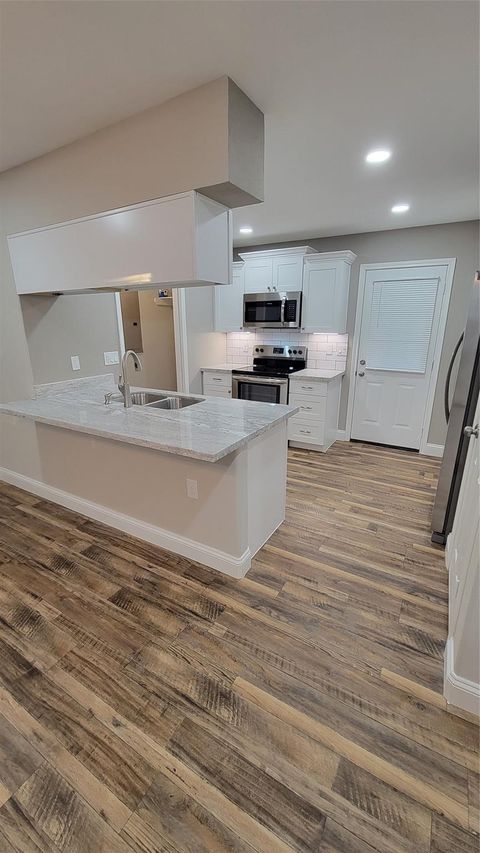 Photo of 305 E Foley Unit B Street, Alvin, TX 77511 (MLS # 51377766)