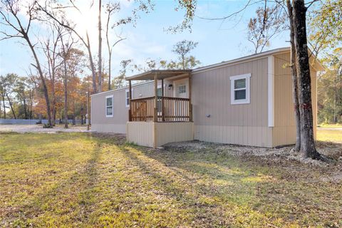 Photo of 1300 Campbell Acres Road, Cleveland, TX 77328 (MLS # 57753506)