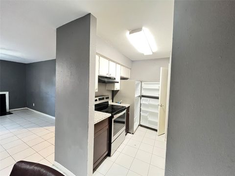 Photo of 10211 Sugar Branch Drive #411, Houston, TX 77036 (MLS # 24056184)