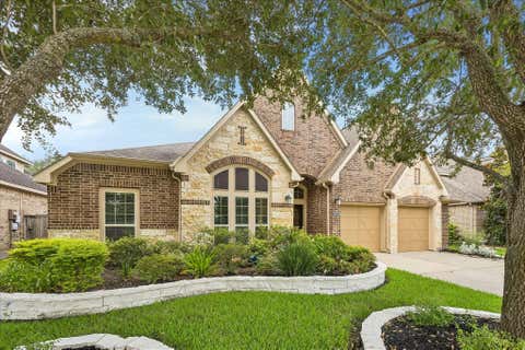 Photo of 10223 Radcliff Lake Drive, Katy, TX 77494 (MLS # 56353071)