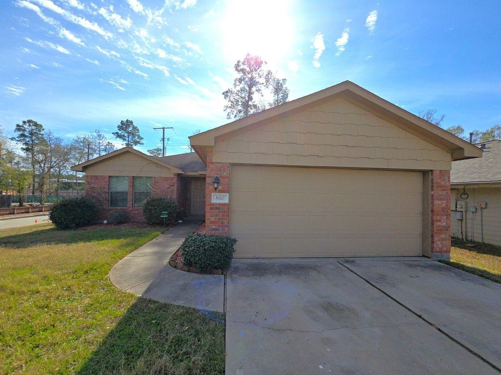 Photo of 810 Lightningbug Lane, Conroe, TX 77301 (MLS # 55461632)