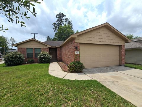 Photo of 810 Lightningbug Lane, Conroe, TX 77301 (MLS # 55461632)