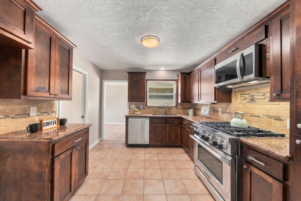 Photo of 5802 Jason Street, Houston, TX 77074 (MLS # 55943876)