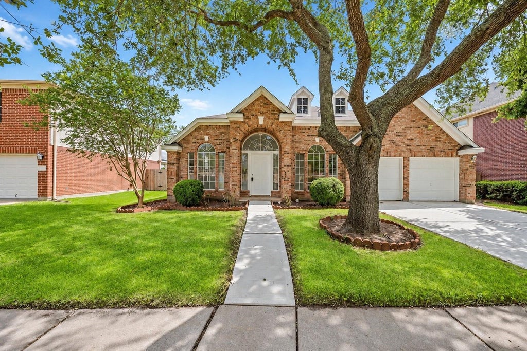 Photo of 16119 Mission Glen Drive, Houston, TX 77083 (MLS # 91524069)