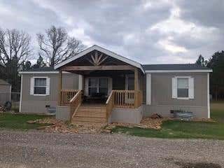 Photo of 10932 Blackland Road, Willis, TX 77318 (MLS # 67568228)