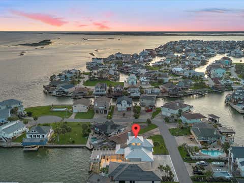 Tiny photo for 1311 Oahu Drive, Tiki Island, TX 77554 (MLS # 13559171)
