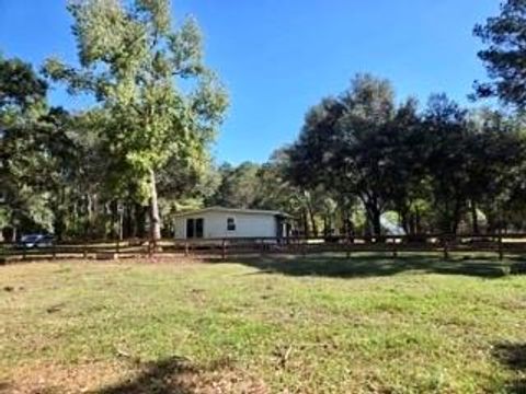Photo of 441 Wonderland Drive, Shepherd, TX 77371 (MLS # 95846831) Photo of 441 Wonderland Drive, Shepherd, TX 77371 (MLS # 95846831)