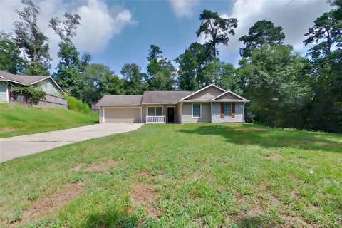 Photo of 10951 Royal Forest Drive, Conroe, TX 77303 (MLS # 65681026)