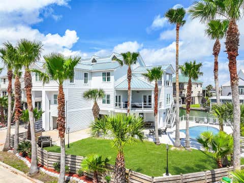 Photo of 1614 Castaway Street, Tiki Island, TX 77554 (MLS # 2175521)