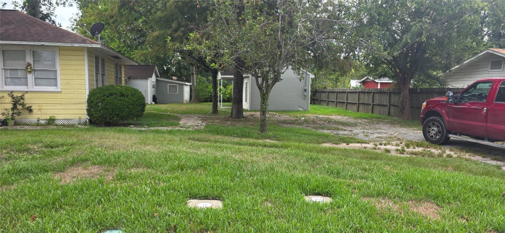 Photo of 813 N Avenue D, Humble, TX 77338 (MLS # 49267692)