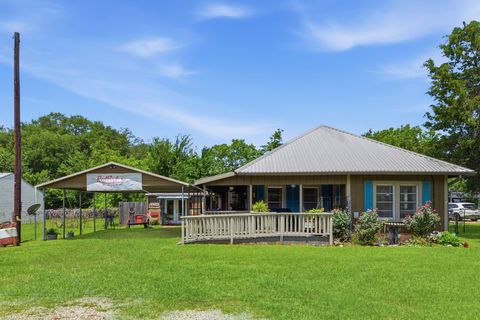 Photo of 9282 State Highway 75 S, New Waverly, TX 77358 (MLS # 21120207)