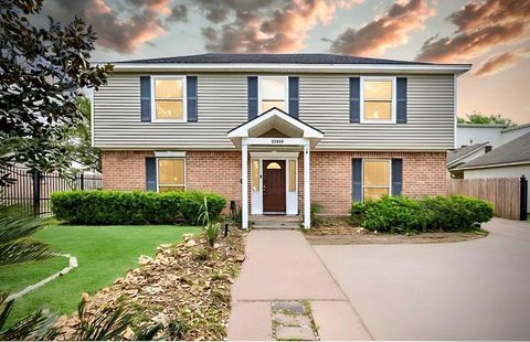 Photo of 11319 Briar Forest Drive, Houston, TX 77077 (MLS # 52827088)