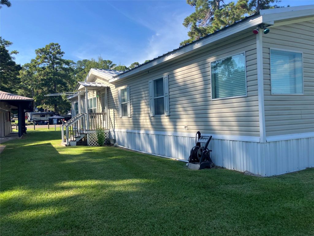 Photo of 50 Wolf Creek Park Rd, Coldspring, TX 77331 (MLS # 65563860)
