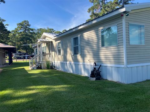 Photo of 50 Wolf Creek Park Rd, Coldspring, TX 77331 (MLS # 65563860)