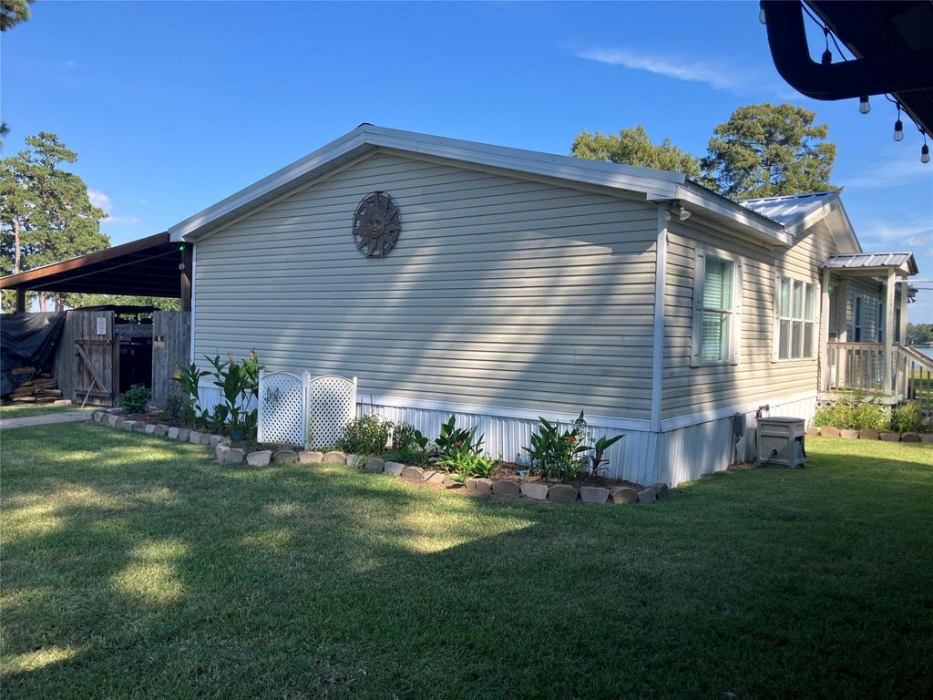 Photo of 50 Wolf Creek Park Rd, Coldspring, TX 77331 (MLS # 65563860)