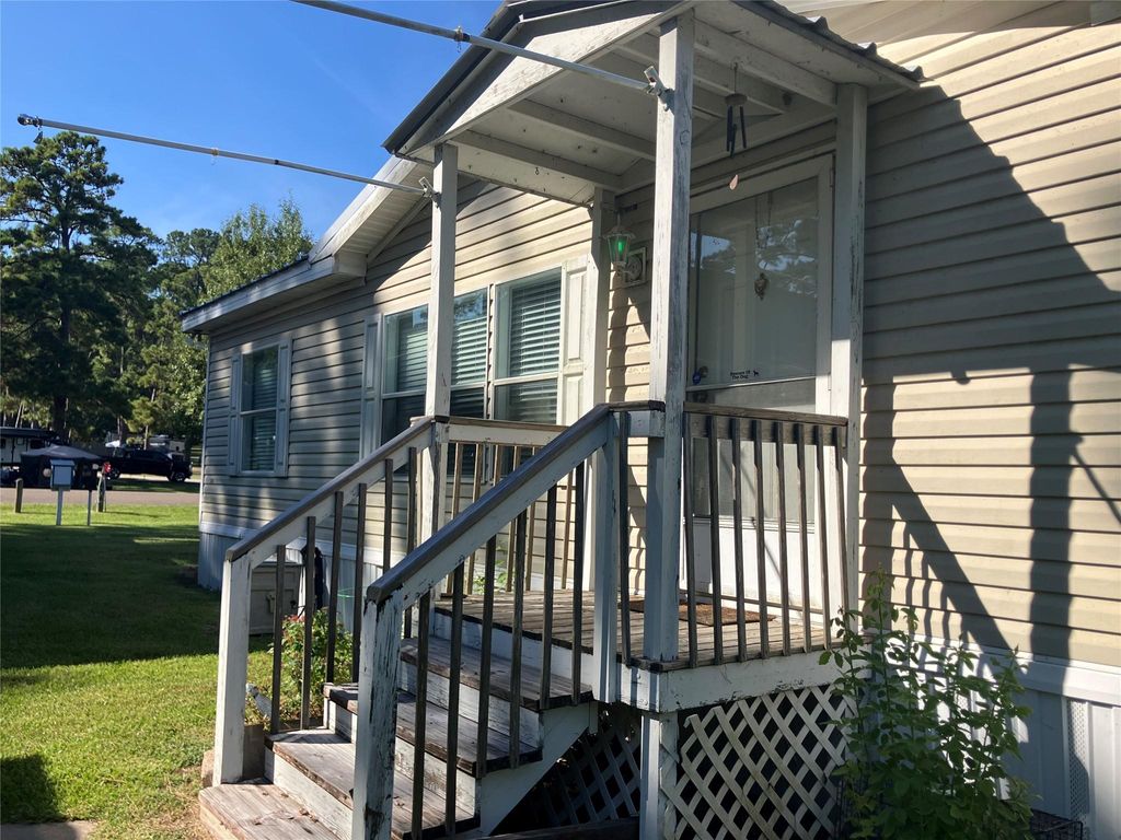 Photo of 50 Wolf Creek Park Rd, Coldspring, TX 77331 (MLS # 65563860)