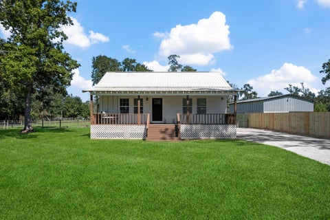 Photo of 319 County Road 2218, Cleveland, TX 77327 (MLS # 24144938)