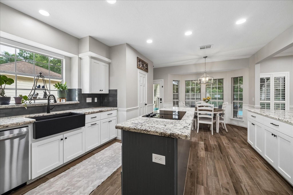 Photo of 2411 Kings Lodge Drive, Kingwood, TX 77345 (MLS # 58461472)