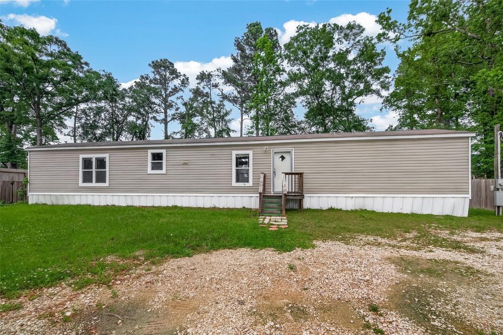 Photo of 23249 E Community Drive, New Caney, TX 77357 (MLS # 94291399)