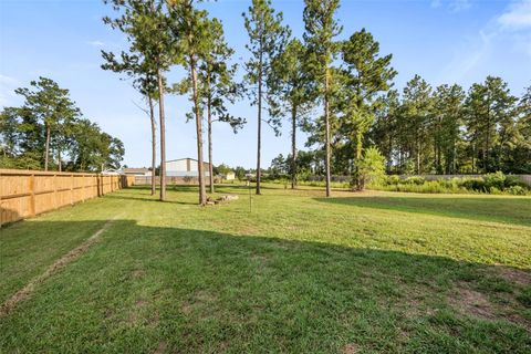 Photo of 1044 Road 5203, Cleveland, TX 77327 (MLS # 57744866)