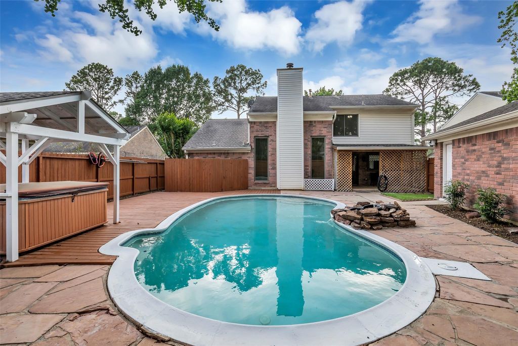 Photo of 8707 Rocky Valley Drive, Houston, TX 77083 (MLS # 27148175)