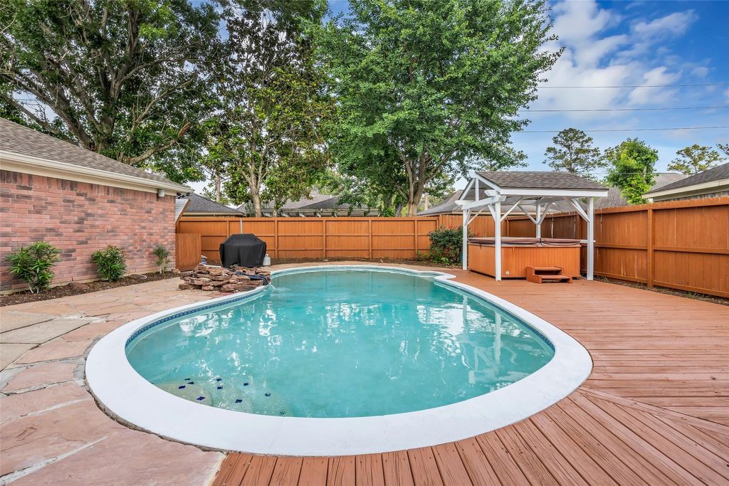 Photo of 8707 Rocky Valley Drive, Houston, TX 77083 (MLS # 27148175)
