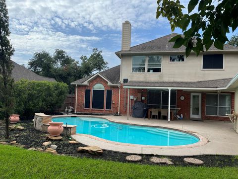 Photo of 13030 Mossy Ridge Cove, Houston, TX 77041 (MLS # 80578068)