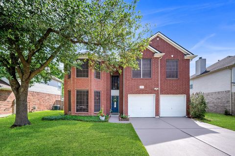 Photo of 18702 Woodbreeze Drive, Humble, TX 77346 (MLS # 28796651)