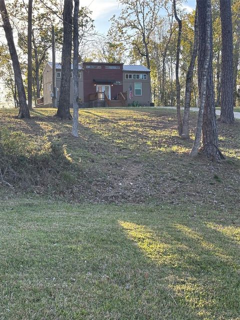 Photo of 373 N Saddle Surrey Road, Coldspring, TX 77331 (MLS # 42239080)