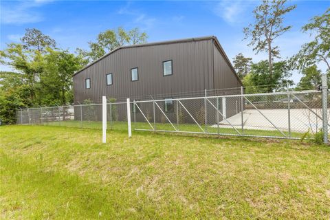 Photo of 11002 Sleepy Hollow Road, Conroe, TX 77385 (MLS # 28319969)