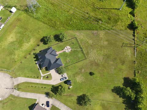 Photo of 14675 Broken Arrow Road, Santa Fe, TX 77517 (MLS # 59392304)