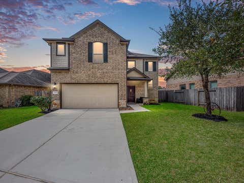 Photo of 623 Orchid Hill Drive E, Conroe, TX 77301 (MLS # 86562016)