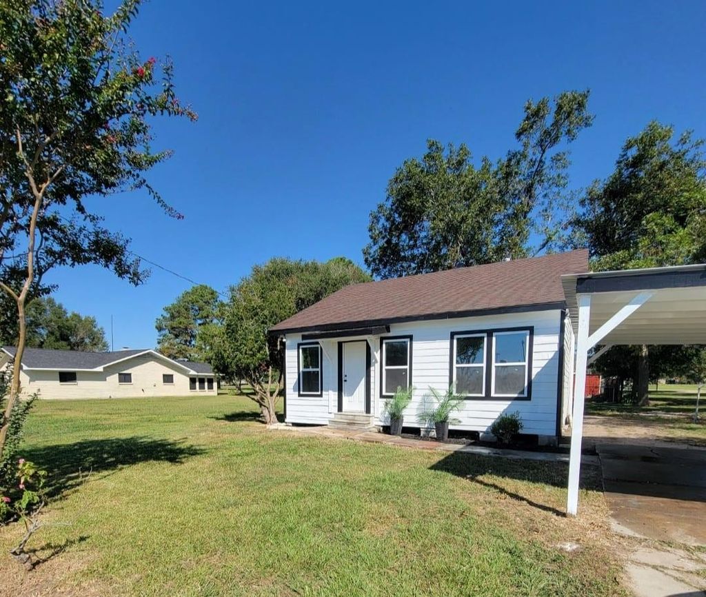 Photo of 801 Willcox Street, Anahuac, TX 77514 (MLS # 93823861)