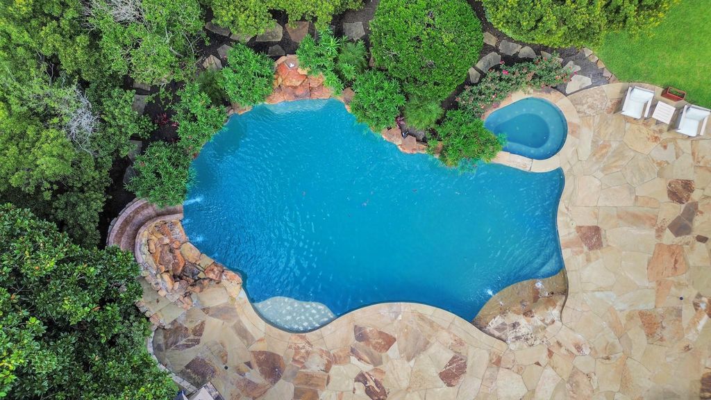 Photo of 6302 S Royal Point Drive, Kingwood, TX 77345 (MLS # 65968485)