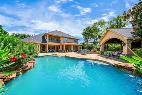 Photo of 6302 S Royal Point Drive, Kingwood, TX 77345 (MLS # 65968485)