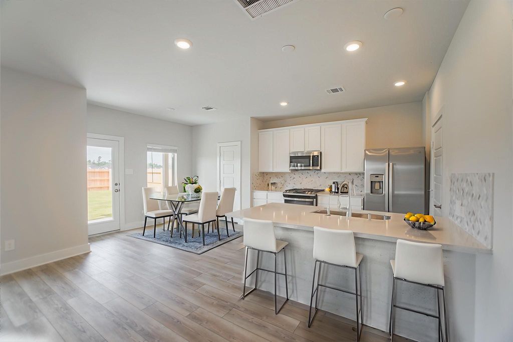 Photo of 10530 Preserve Way, Conroe, TX 77385 (MLS # 86658816)