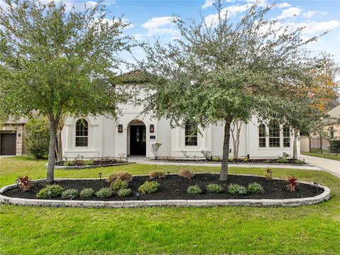 Photo of 7 Valley Cottage Place, Spring, TX 77389 (MLS # 94200310)