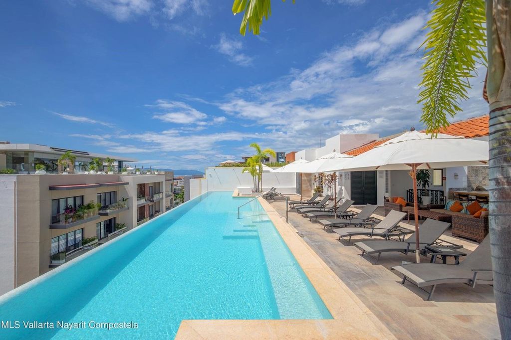 Photo of 275 Venustiano Carranza #304, MI 48380 (MLS # 59675926)