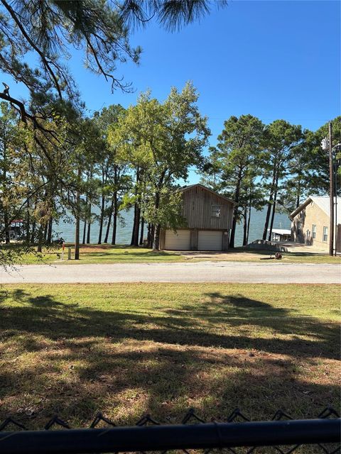 Photo of TBD Bridgelanding--- Lot 55, Onalaska, TX 77360 (MLS # 77494774)