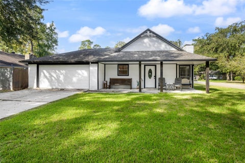Photo of 115 Ponderosa Trail, Conroe, TX 77301 (MLS # 74118381)